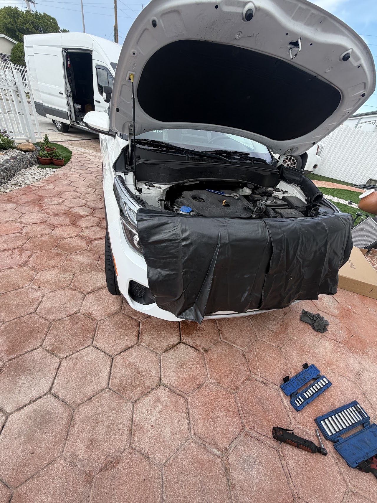 Yusbel Mobile Mechanic servicing a car on-site in Hialeah