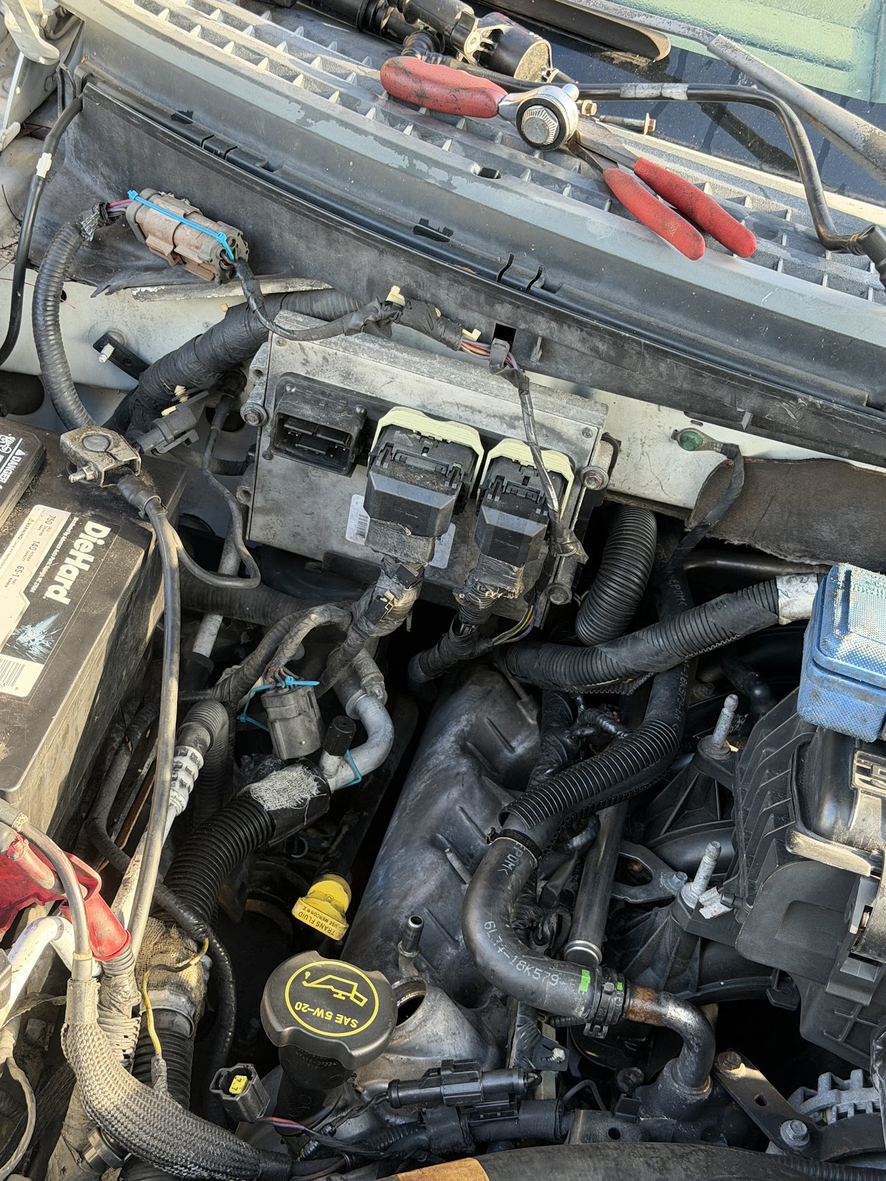 Engine bay repair by Yusbel Mobile Mechanic