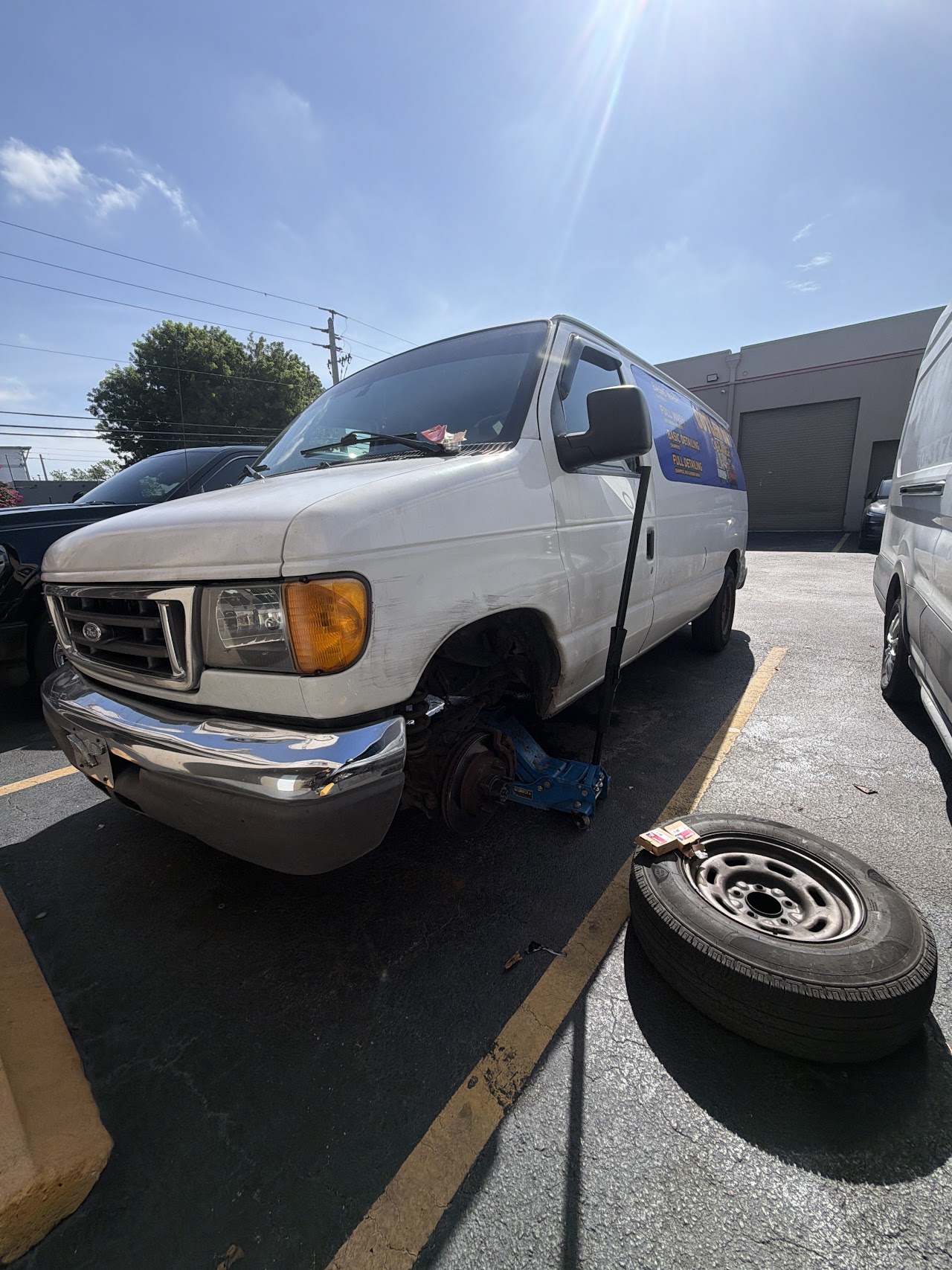 Mobile service van on a roadside tire change